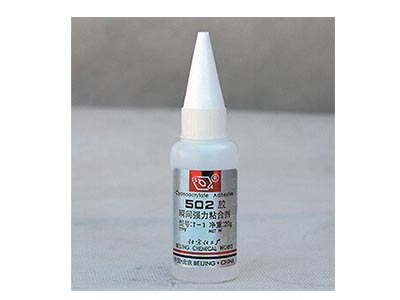 502熏顯膠